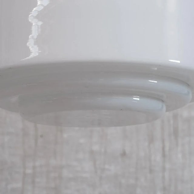 Mid-Century French Brass and Opaline Pendant Light, in Good conditions. Designed 1950 to 1959 UK Plug (up to 250V).The...