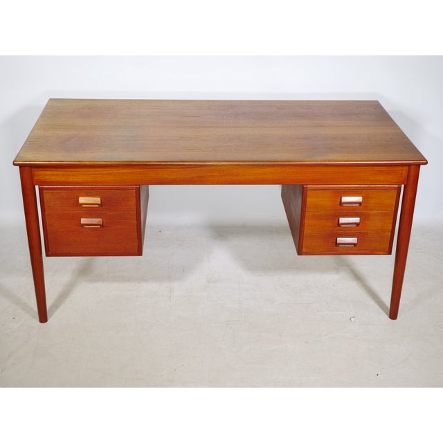 Børge Mogensen desk for Søborg Møbelfabrik, Denmark, 1960s. Made of teak with a clean, functional design and a gently...