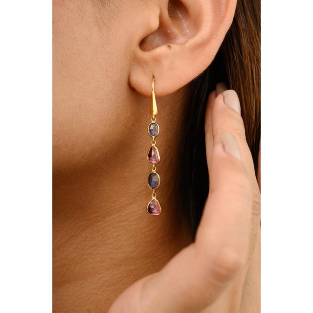 This is part of Chairish’s Fine Jewelry assortment. Indulge in a kaleidoscope of hues with these enchanting multi sapphire...