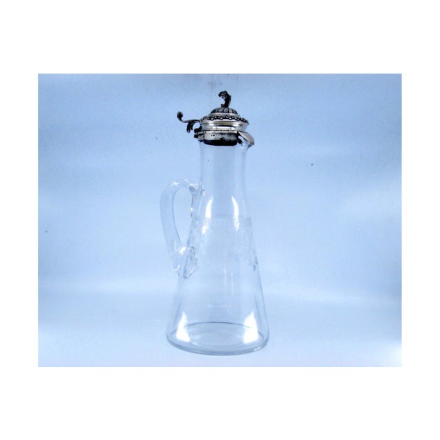 Glass Water Jug with Knob Cut Out on the Silver Lid, in Good conditions.