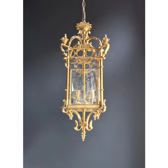 Introducing an array of exquisite large cylindrical lantern pendant lights, crafted from brass and glass, combining both...