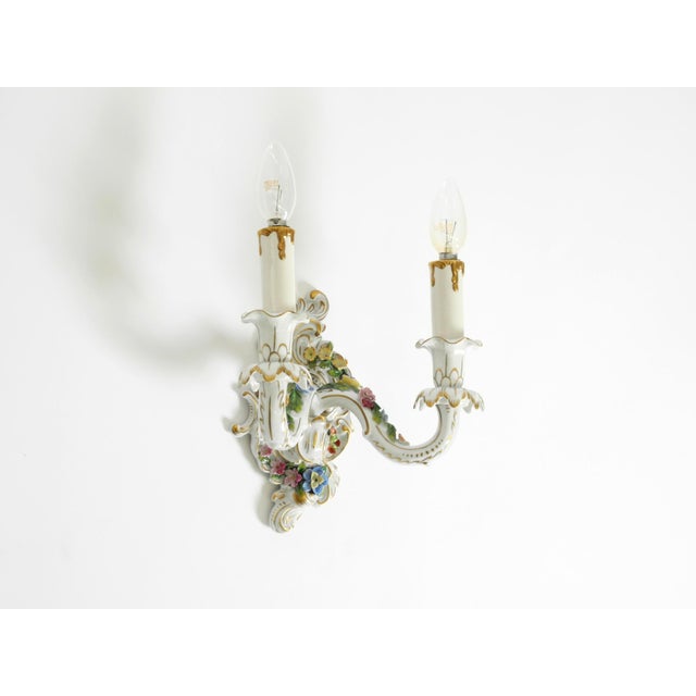 Beautiful hand-painted mid-century modern porcelain wall lamp. Made by the saxon porcelain manufactory in dresden. the...