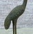 Pair of 20th Century Cast Iron Crane Sculptures. Cranes are crafted with meticulous attention to detail, capturing the...