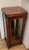 An elegant and well-balanced antique display cabinet in briar root wood, dating back to the late 19th century. The...