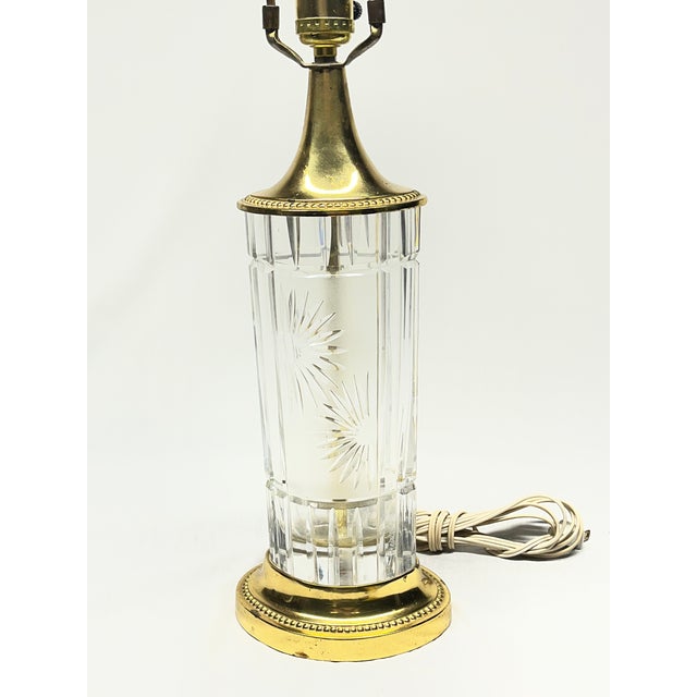 This striking mid-century modern table lamp features a brilliant column of thick, authentic German Dresden cut crystal....