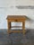 This side table features turned legs, an apron, and a single pull-out drawer. The overall silhouette offers a timeless...