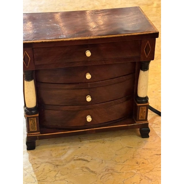 This 19th century Austrian Biedermeier miniature commode is a beautifully crafted piece . The details and quality of this...
