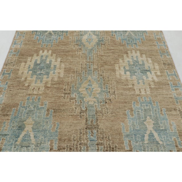 This 5x7 Abstract Tribal rug from Rug & Kilim’s Modern Classics Collection is a luminous, high-contrast work of art, hand-...