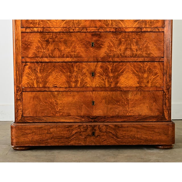 A gorgeous 19th century French walnut chest of drawers--eight drawers to be exact--designed as a classic Louis Philippe...