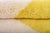 A single bold gesture against a field of calm. A striking triangle of process yellow anchors this piece, its sculptural...