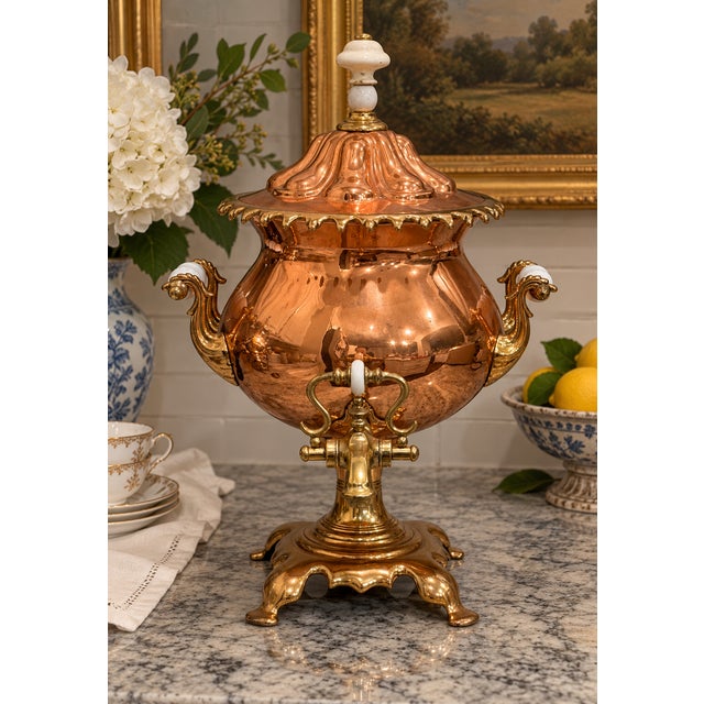 A striking mid-19th-century Victorian copper and brass samovar or hot water tea urn, circa 1860, attributed to England...