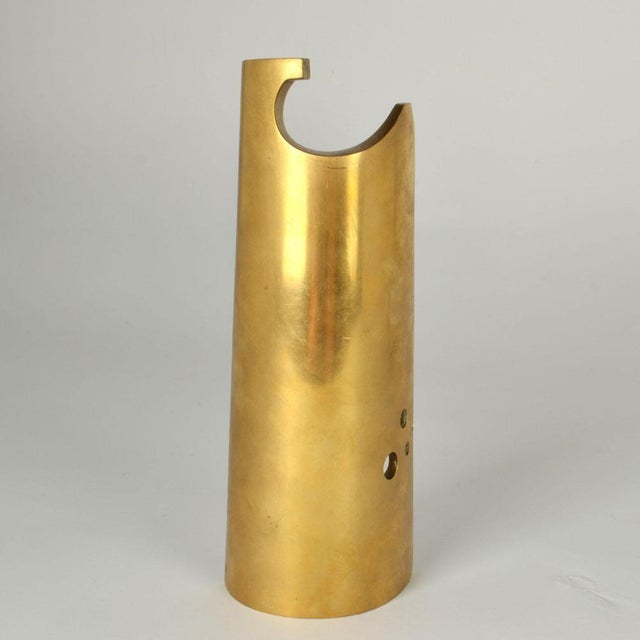 Abstract sculpture in brass suggesting a cloaked figure si Dutch 1970's