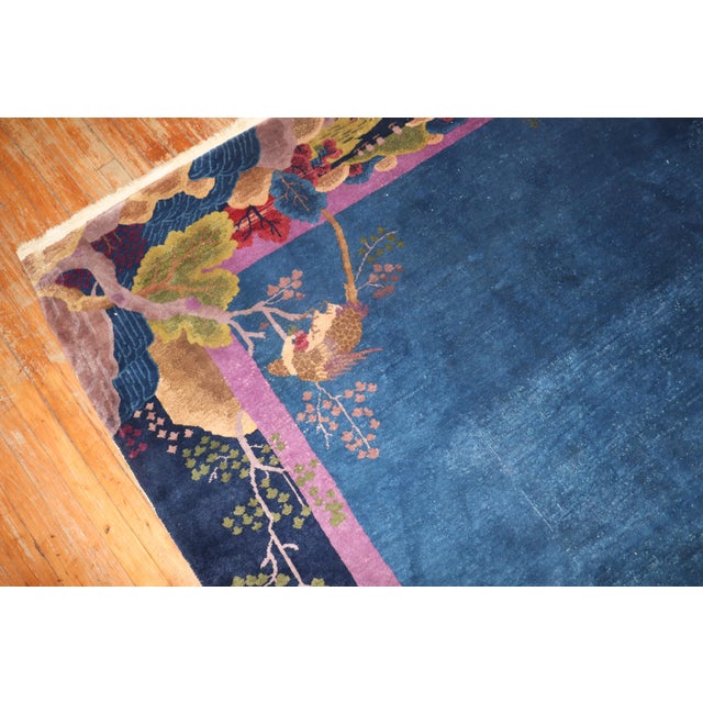 An exotic color room size Chinese Art Deco Rug from the 1930s. Measures: 8'10" x 11'6''