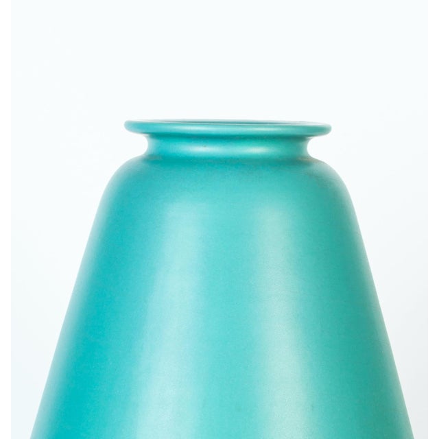 Aqua green ceramic vase is a vintage ceramic decorative object, realized during the 1950s. A very beautiful aqua green...