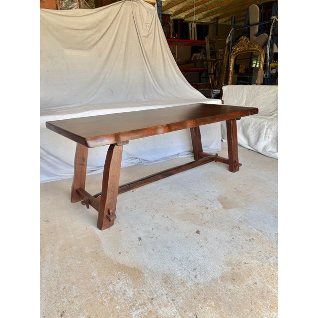 This Mid 20th Century Scandinavian Oak Dining Table dates back to the 1960's and is attributed to Finnish designer Olavi...