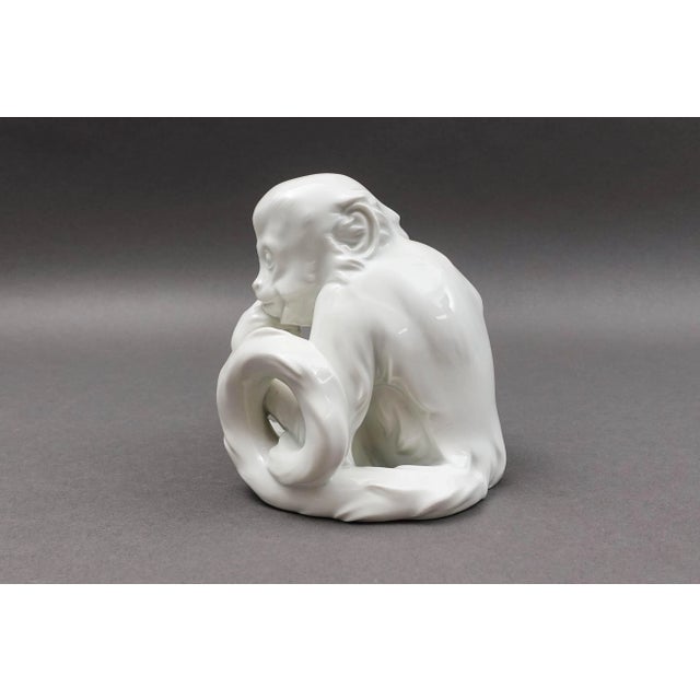 Robert Ullmann Royal Vienna Augarten Wien Austria White Porcelain Sitting Monkey #1722. Measures approximately 5 1/8"...