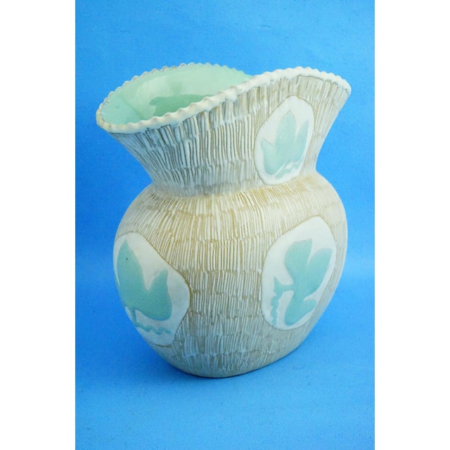 Measurements: height: 20 cm; width: 18 cm; depth: 12 cm; weight: 0.975 kg item : majolica vase, entirely hand-shaped on a...