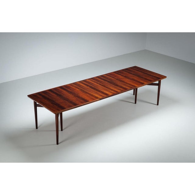 Large dining table model 201 designed by Arne Vodder for Sibast Møbler, Denmark, circa 1960. An elegant and refined...