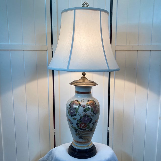 Elevate your interior with this striking mid-to-late 20th-century vintage Japanese Satsuma style ceramic table lamp....