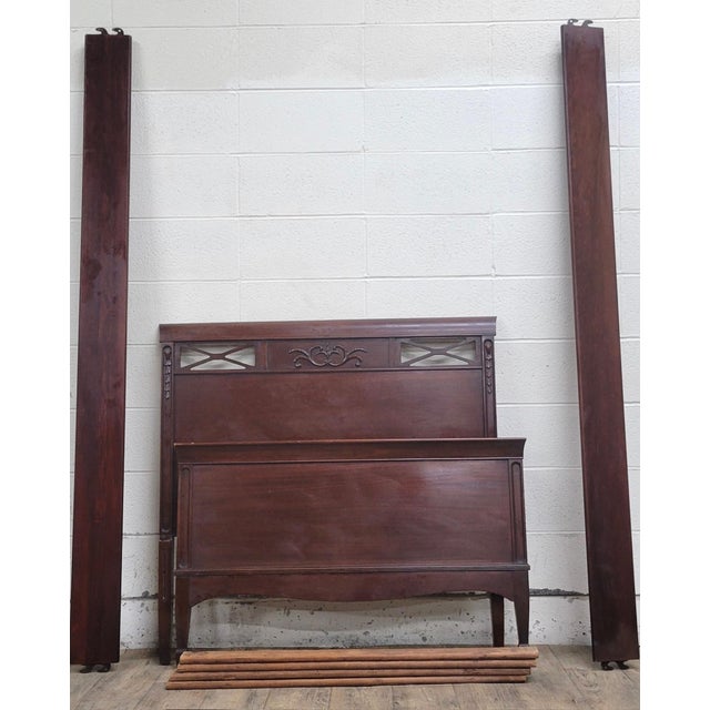 This is an absolutely stunning vintage cherry twin sleigh bed. It features a beautifully carved headboard, carved sides,...