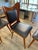 Vintage Italian design chairs from the 1950s, attributed to Carlo Ratti. Made with a wooden frame, featuring an...