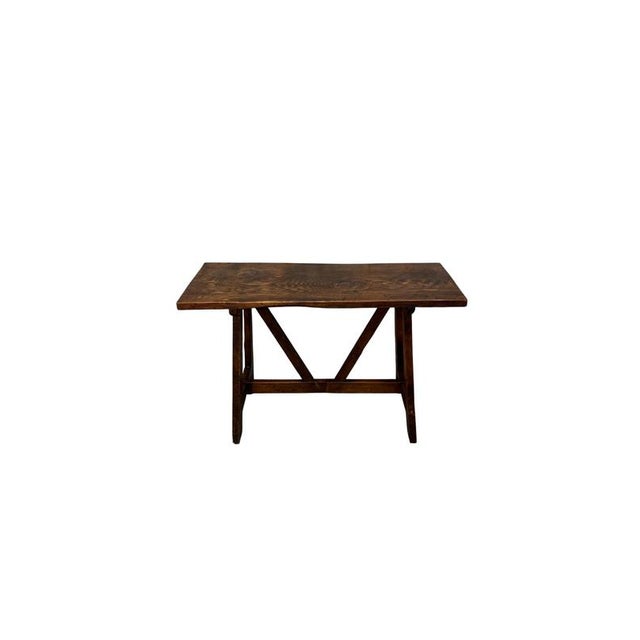 An authentic 19th-century refectory-style table, crafted from fir wood and featuring a solid structure and simple lines,...
