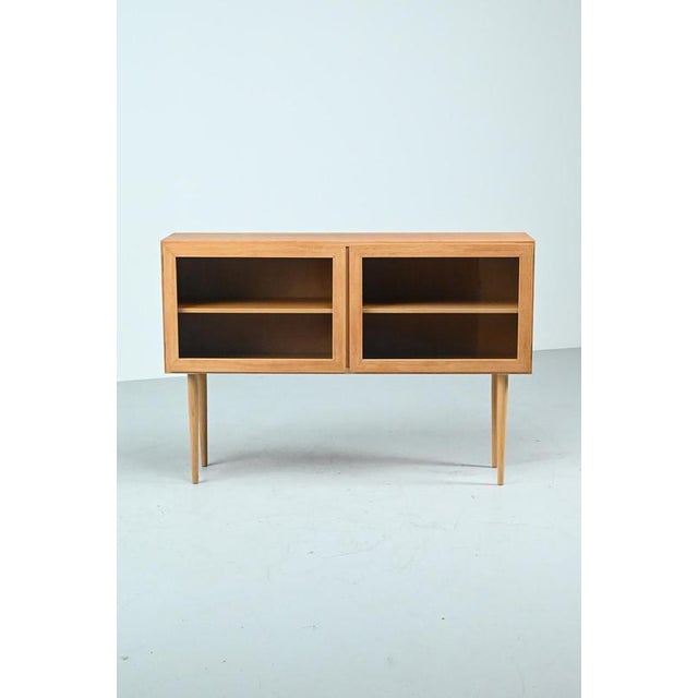 Gunni omann showcase produced in the sixties by danish manufacturer omann jun. The doors have typical omann features. This...