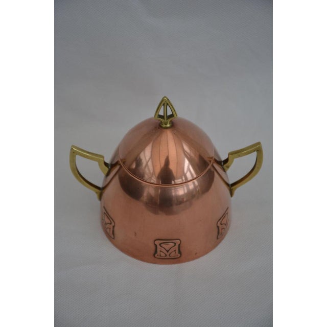 Very stylish WMF Art Nouveau Secession copper plated and brass sugar bowl with original lift up lid, two brass handles and...