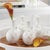 Turning tradition on its head with the fun chic of this 4-piece mini bud vase set. Use as one or in multiples to create...
