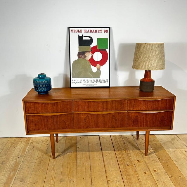 Austinsuite teak chest of drawers, 1960s produced by austinsuite in the 1960s, this chest of drawers showcases one of the...