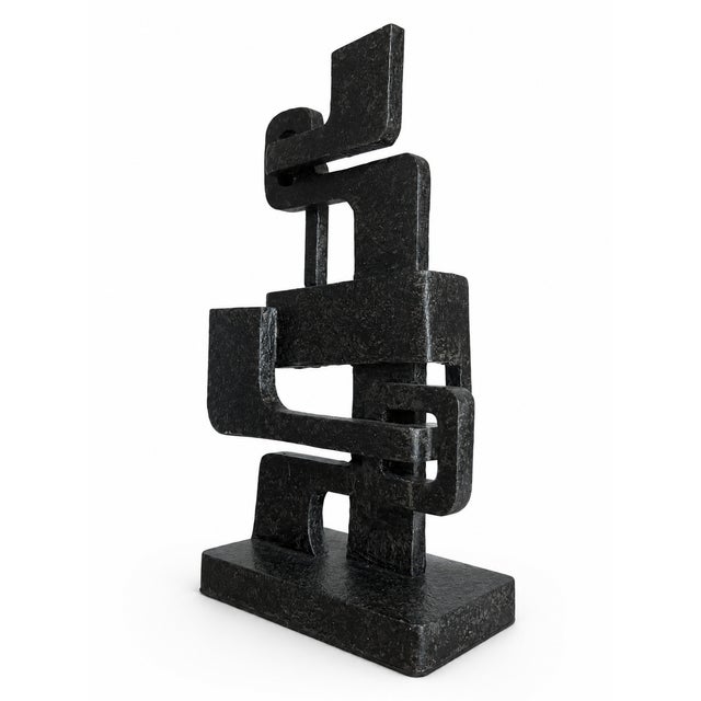Add architectural depth to your interior with the striking "Kubric" geometric abstract sculpture from upscale retailer ACD...