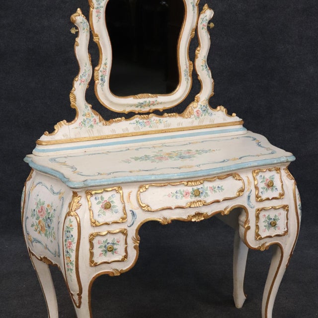 This fantastic antique Italian Venetian bombe vanity with mirror is a striking example of Old World artistry and timeless...