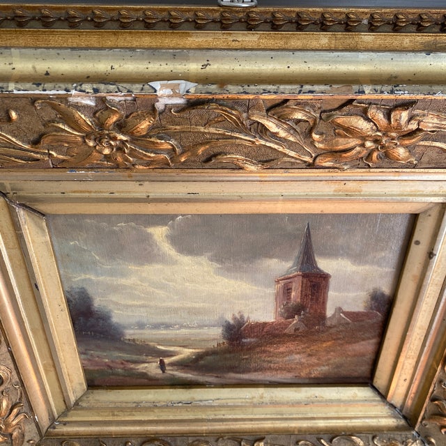 19th Century scenic oil on canvas housed in an ornate distressed gold gilt frame. Signed by the artist in the lower right,...