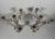Pair of rococo candelabra in 950 sterling silver. in the 18th-century louis xv style. the circular base with contoured...