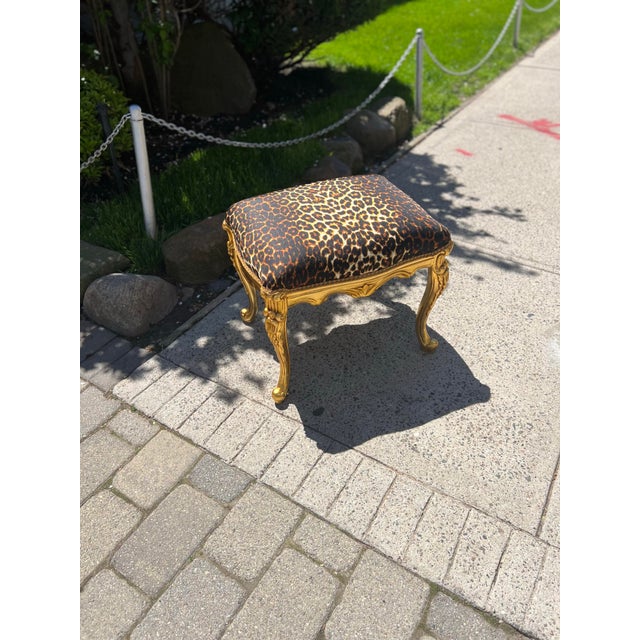 Leopard Print Banquet stool ottoman made From real solid wood gilded by real gold leaf. Width 22”, depth 15” and Height of...