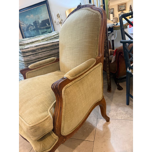 Chestnut Antique French Hand Carved Walnut Bergere Chair For Sale - Image 8 of 12