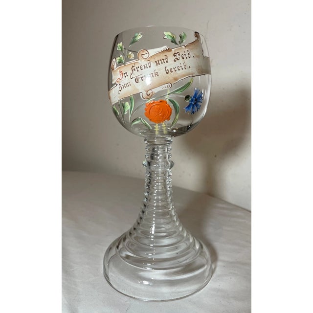 Up for sale is a large vintage handmade enameled German glass goblet. It's blown into a gorgeous ribbed circular shaft...