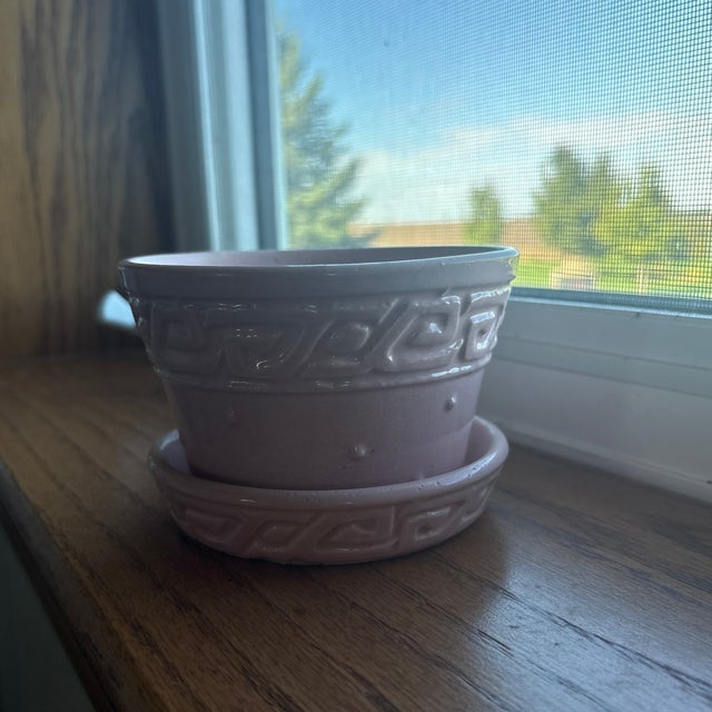 McCoy pottery pink flowerpot. Greek key design with hobnails. Good condition. Clear mark on bottom. Height approx. 3.5...