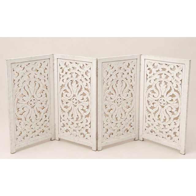 A beautifully detailed vintage folding screen with the character of an architectural find. Style it behind a console, use...