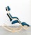 Office/rocking chair from Norway by Stokke. Upholstered in blue fabric. Excellent condition. This piece has an attribution...