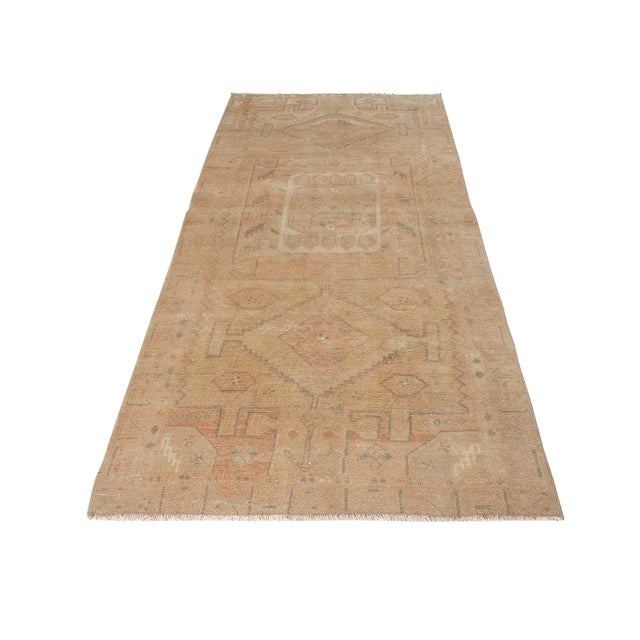 Decorative washed out handknotted vintage Persian Tabriz rug. Approximately 50-60 years old. In very good condi.