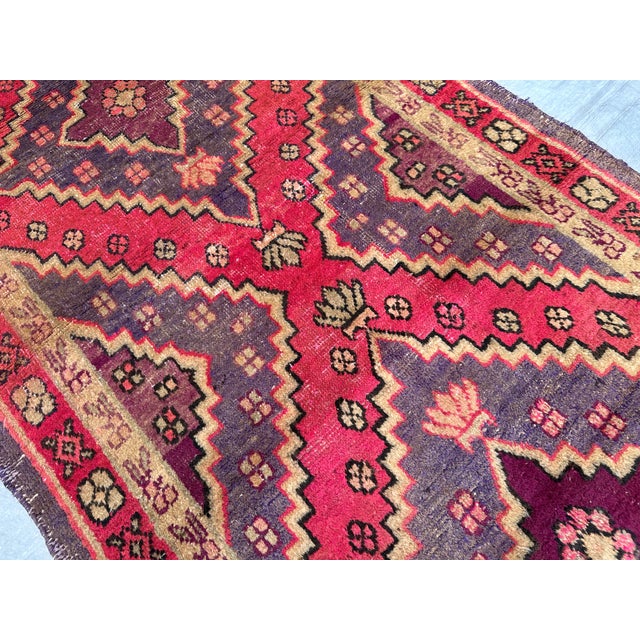 A genuine antique Qashqai-Shiraz tribal runner, hand-knotted in lustrous wool — two bold stacked diamond medallions...
