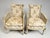 A distinguished matched pair of French Louis XVI-style bergère armchairs by Hibriten Chair Co., Inc. of Lenoir, North...