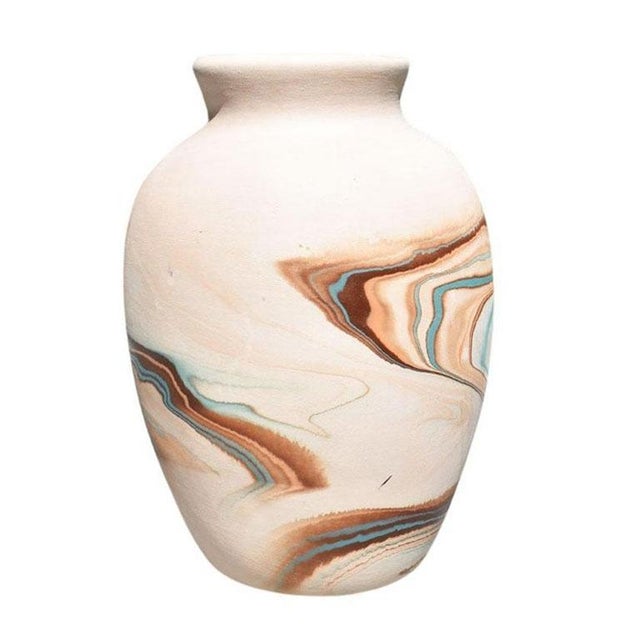 A beautiful ceramic nemadji vase. Marbled in unglazed turquoise, brown, and orange, this will be a beautiful piece to add...