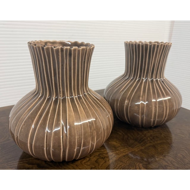 Design Plus Gallery presents a Pair of Ribbed Ceramic Vases by Barbara Eigen. The artist is known for her vegetable-...
