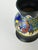 This Dutch Gouda vase by Zuid, produced in Holland in 1922, features the Corona pattern with richly hand-painted floral...