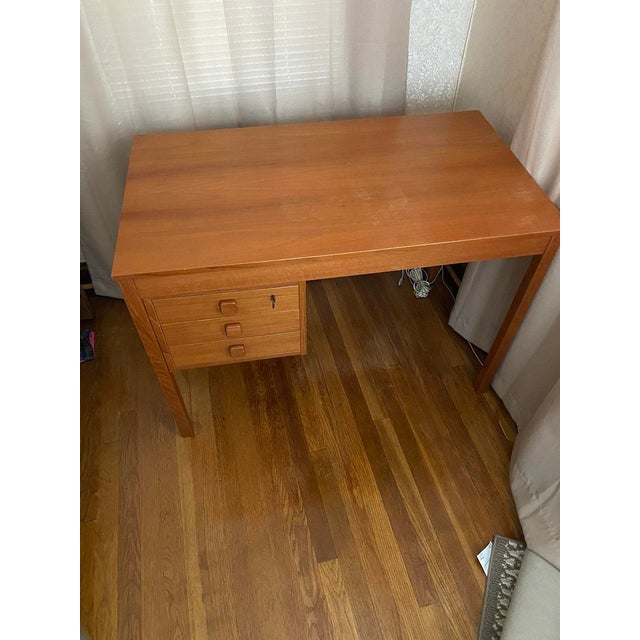 Features: • Made in Denmark, with high-quality teak wood. • Includes 3 drawers on the left with handles. • Excellent...