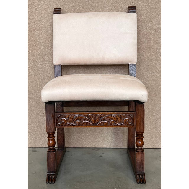 Set of 6 Spanish carved walnut dining chairs with upholstered seat and back. Details Dimensions Height: 35.63 in. (90.5...