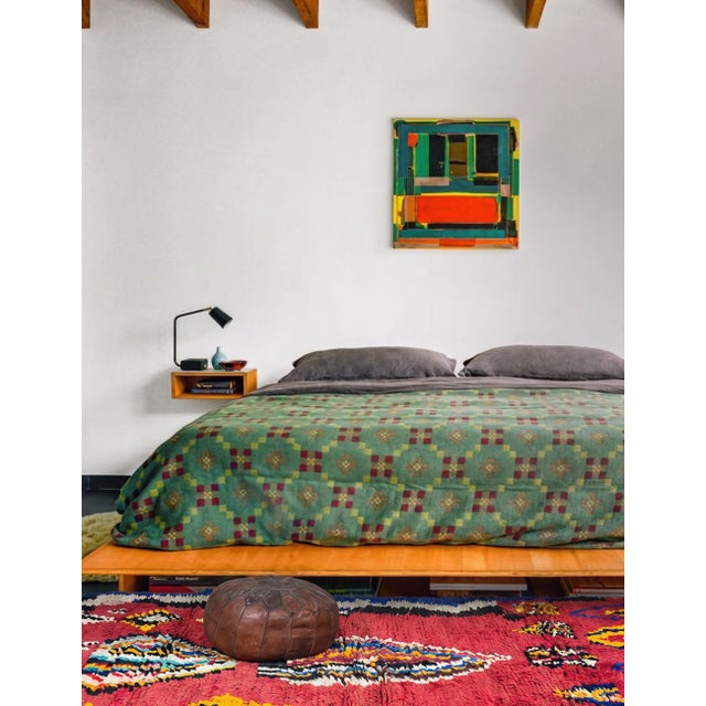 Boujad Rug | Handwoven Berber Wool Rug with Red Field and Tribal Flame Motifs This vibrant Boujad rug features a bold red...