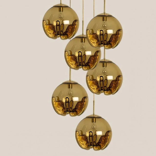 Great Mid-Century Modern glass bowl pendants by Mazzega Murano. An Italian design from the 1970s. Beautiful pendant, truly...